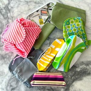 Assorted travel accessories. Makeup or jewelry bags.sold as a set of 9.